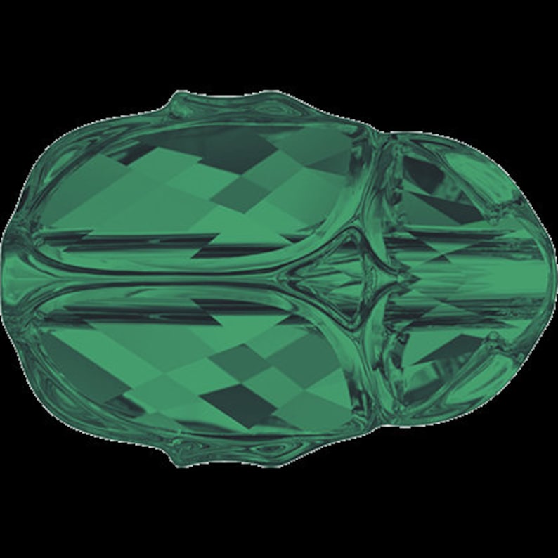 May include: A green faceted glass bead with a unique, organic shape. The bead has a smooth, polished surface and a deep, rich green color.