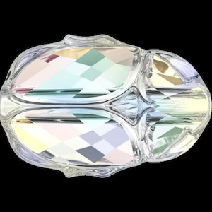 May include: A clear glass bead with a faceted design, featuring iridescent colors of pink, blue, green, and gold.
