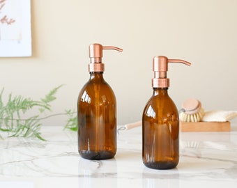 Minimalistic & refillable soap dispenser: amber glass bottle with copper-look stainless steel pump