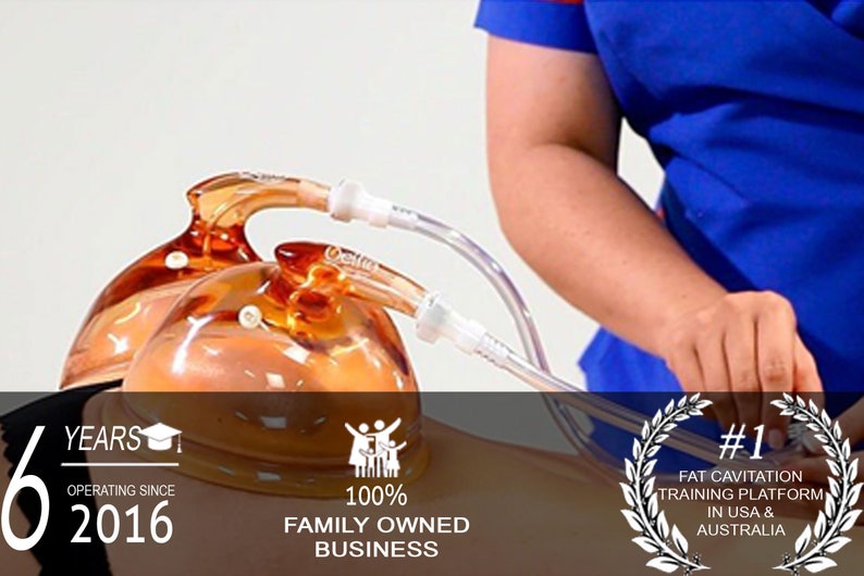 May include: A woman in a blue uniform uses a device with two orange suction cups on a person's body. The device is connected to a hose. The image includes the text "#1 FAT CAVITATION TRAINING PLATFORM IN USA & AUSTRALIA".