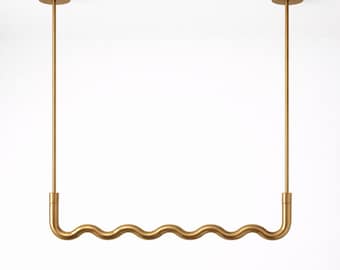 Sculptural Brass Garment Rail – Ceiling Suspended Wavy Clothes Hanging Bar