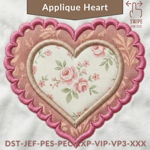 May include: A heart-shaped applique design with a floral pattern center and a scalloped edge. The design features a light pink and cream color scheme, with the text "Applique Heart" at the top. The design is on a white background.