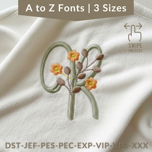May include: Cream-colored fabric with an embroidered letter "R" in a soft green hue, adorned with orange flowers and brown accents. The text "A to Z Fonts | 3 Sizes" is at the top. The image also includes the text "SWIPE FOR SIZES" and file type abbreviations.