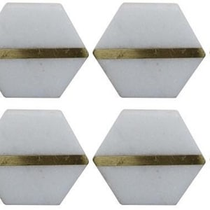 May include: Six white marble hexagon cabinet knobs with a horizontal gold-colored band across the center. The knobs are arranged in two rows of three, showcasing a minimalist design.