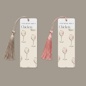 May include: Two rectangular bookmarks with rounded corners, each featuring the text THIS BOOK AND A Chicken Wine. One bookmark has a beige background with wine glass illustrations and a beige tassel, the other has a pinkish tassel and wine glasses.