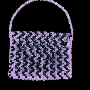 Bolsos para mujer del Mercado de Artesanía Africana. Bolsos multiusos, bandoleras, bolsos tote, bolsos de viaje, bolsos de compras, carteras y más.