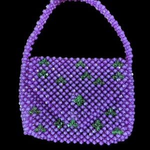 Bolsos para mujer del Mercado de Artesanía Africana. Bolsos multiusos, bandoleras, bolsos tote, bolsos de viaje, bolsos de compras, carteras y más.