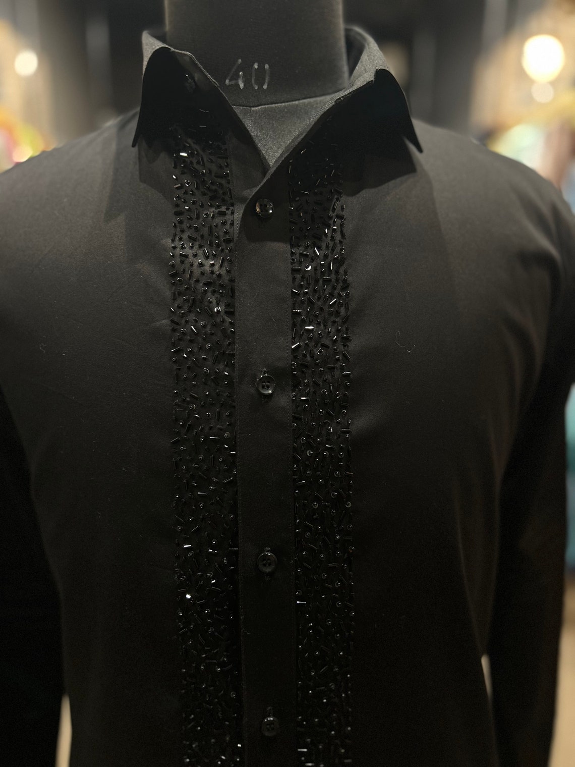 Black tuxedo with cutdana embellishment