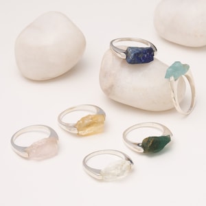 Raw crystal gemstone rings in silver. Natural birthstone rings for women and men. Casual wear rings in natural rough stones. Statement rings