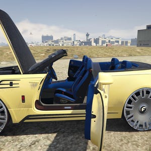 May include: A yellow convertible car with the hood open and doors ajar. The car has blue interior and large silver rims. The background shows an airport and a clear sky.