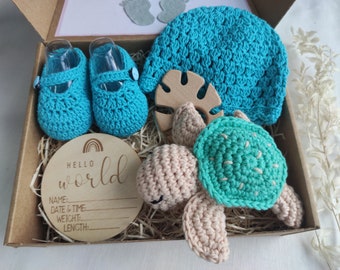 Beanie and baby shoes basket for new baby announcement, Sleeping plush toy for baby, Hat and booty box to share pregnancy with the family