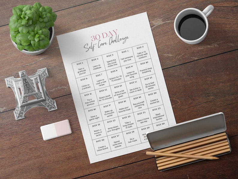 May include: A printable 30-day self-care challenge checklist with daily activities to promote well-being. The checklist is printed on white paper and includes activities such as starting a gratitude journal, learning to meditate, taking a walk outdoors, listening to a podcast, and reading inspirational quotes.