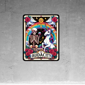 May include: A tarot card illustration featuring a skeleton and a unicorn, both holding wine glasses. The card is titled "The Audacity" and has a rainbow background with roses.