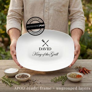 May include: A white oval platter with the text "DAVID King of the Grill" and a crossed fork and spatula design. The platter is held by a person. The image also includes small bowls of spices and herbs.