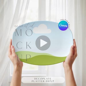 May include: A rectangular decorative platter with a sky and grass design, held up by hands. The platter has the words "animated MOCK UP" and "DECOPLATE PLATTER D9727" printed on it. A Canva logo is in the upper right corner.