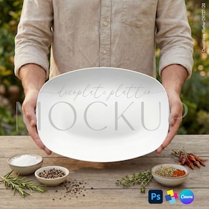 May include: A large, white oval platter held by a person. The platter has the text "decoplate platter MOCKUP" in a light gray script. Small bowls of salt, pepper, and spices are on a wooden table.