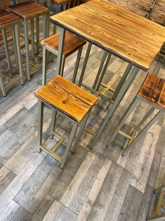 Tall round bar table and stools sale