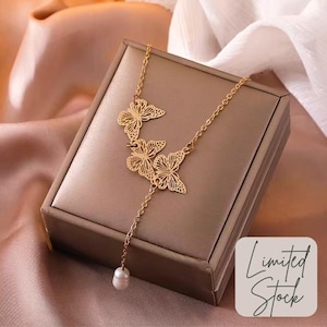 Golden Butterfly & Pearl Necklace – Graceful Elegance Redefined