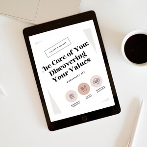 May include: A digital tablet displaying a worksheet set titled "The Core of You: Discovering Your Values". The worksheet set includes a worksheet template, coach helper, and additional resources.