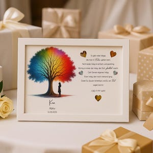 May include: A white framed print with a rainbow tree and a silhouette of a person standing beneath it. The print includes a poem about life and love. The text reads: "It goes without saying, life is not in color, it's in living.  Not every day is easy and good.  Being in love is the key to the joy that joyfully waits.  Get to know your own heart.  Even flowers, the most beautiful things,  Don't stay forever, and so do you.  Let  your heart  open  I  DID  it  my  way"