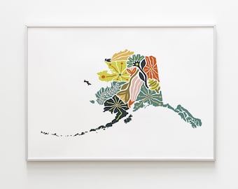 May include: A colorful floral design in the shape of the state of Alaska. The design features a variety of flowers and leaves in shades of green, yellow, orange, and pink.