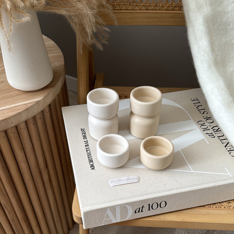 Create a calming atmosphere with the soft glow of your favorite candles, cradled by our minimalist candle holders. Whether for a relaxing evening or a special occasion, they will add a touch of modern sophistication & elegance to your space.