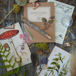 Young Explorers Nature Journal Kit. Write Your Child’s Name on Cover. Kit Includes; Blank Book, Wood Pencil, Stickers and Magnifying Toy.