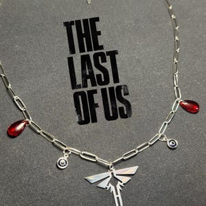 The Last Of Us inspired necklace with fireflies symbol, evil eye + blood droplets - ellie williams/joel miller