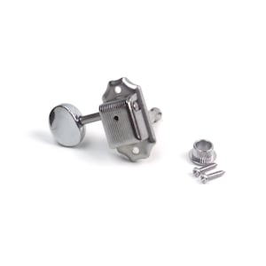 May include: A silver-colored metal guitar tuning peg featuring a rectangular housing with a textured surface, a circular tuning knob, a separate cylindrical bushing, and two small mounting screws for installation on a musical instrument headstock.