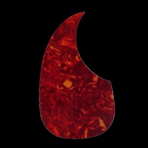 May include: A guitar pickguard with a tortoiseshell pattern. The pickguard is a teardrop shape with a curved top and a flat bottom edge. The pattern is a mix of dark red, brown, and orange hues, creating a marbled effect against a black background.