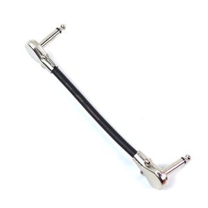 May include: A black instrument cable with angled connectors. The cable has silver-colored plugs on each end and a black rubberized cable in the middle. The connectors are angled at 90 degrees.