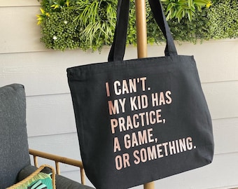 I can’t. My kid has practice a game or something Tote Bag rose gold and black