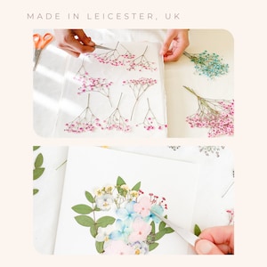 May include: A close-up of a person arranging dried flowers on a white surface. The flowers are pink, blue, and white. The person is using tweezers to carefully place the flowers. The text "MADE IN LEICESTER, UK" is visible at the top of the image.