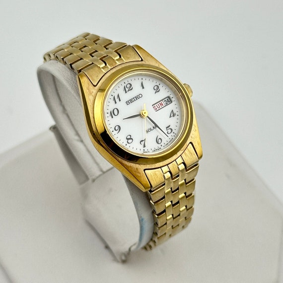 Seiko Solar White Dial Gold Tone Ladies 25mm Quar… - image 1