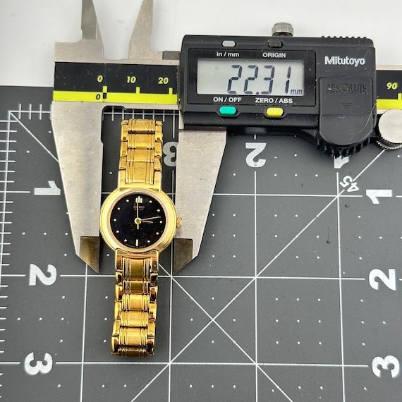 Vintage Seiko Gold Tone Black Dial Ladies 22mm Quartz