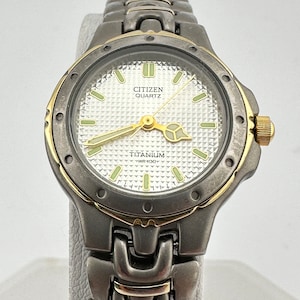Citizen Titanium 25mm Ladies Watch with Textured Dial Gold plated trim c. Jan 1999