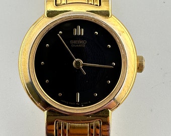 Vintage Seiko Gold Tone Black Dial Ladies 22mm Quartz  display picture 1