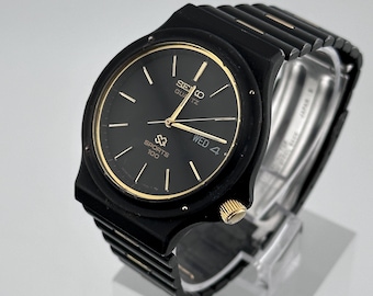 U203 Seiko Quartz Day Date W/ Stretch Band - Ref 7N43 - 0AM0 - Etsy