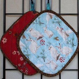 Rabbits Ermines Owls Potholders: berries pine winter blue white green insulated Quilted Machine-Washable homemade