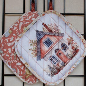 House Potholders: gray green white orange flowers chimney windows Quilted insulated machine-washable machine-dryable homemade