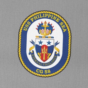 May include: A navy blue patch with a gold rope border and the text "USS PHILIPPINE SEA CG 58". The patch features a crest with a trident, anchor, and stars.