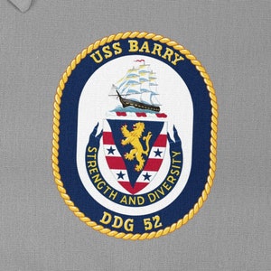 May include: A navy blue and gold circular patch with the text "USS BARRY" and "DDG 52". The patch features a ship with a lion and stars on a shield.