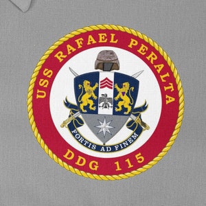 May include: A red and gold circular emblem with the text "USS Rafael Peralta DDG 115" and a coat of arms featuring a lion, a sword, and the text "Fortis Ad Finem".