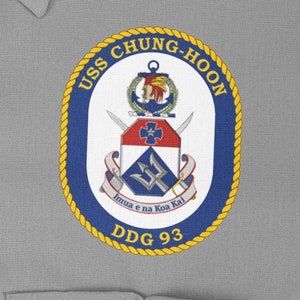 May include: A navy blue patch with a gold rope border and the text "USS CHUNG-HOON DDG 93". The patch features a crest with a white background, a red and blue shield, a gold anchor, and the text "Imua e na Koa Kai".