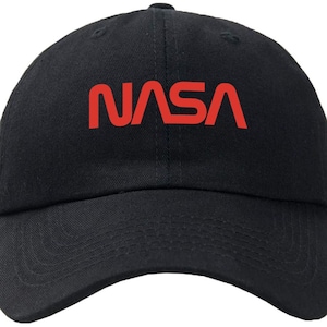May include: A black baseball cap with a red NASA logo embroidered on the front.