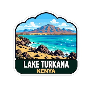 May include: A sticker featuring a landscape illustration of Lake Turkana in Kenya. The scene shows a turquoise lake, a rocky shoreline, and a large mountain under a blue sky with white clouds. The text LAKE TURKANA KENYA is printed at the bottom.