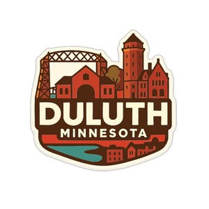 May include: A sticker featuring a stylized illustration of Duluth, Minnesota. The design includes a lift bridge, buildings, and the text "DULUTH MINNESOTA" in a bold font, set against a white background.