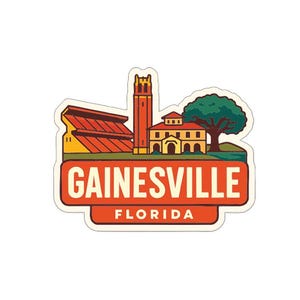 May include: A sticker featuring a stylized illustration of Gainesville, Florida. The design includes a stadium, a tall tower, and a building with a tree. The text "GAINESVILLE FLORIDA" is displayed in a red and white banner.