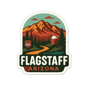 May include: A sticker featuring a scenic landscape of Flagstaff, Arizona. The design includes a mountain range in shades of orange and brown, a winding road, and a Route 66 sign. The text "FLAGSTAFF ARIZONA" is prominently displayed.