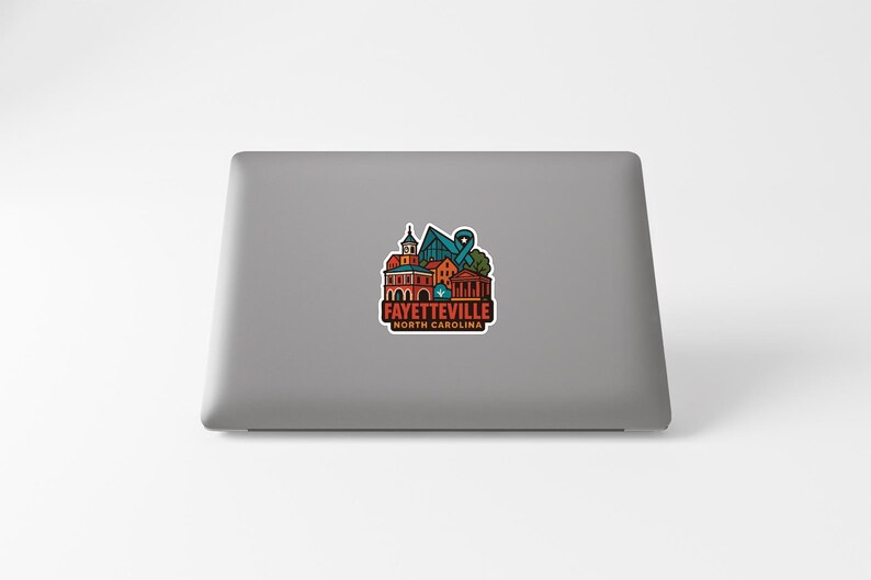 a sticker with a colorful illustration of a city skyline, representing the city of Fayetteville, North Carolina.